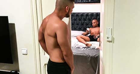 Bearded hunk Dann Grey is feeling sensual this morning and taking some ab selfies before he peeks at his gorgeous man, Dalton Ryder, lying in bed idly caressing his cock.