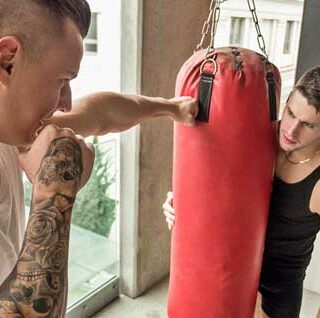 Luke Ward is doing some rounds with the punching bag to keep in shape. He is doing a fucking good job with how ripped he is. This sexy Euro fucker is pure muscle and tattoos.